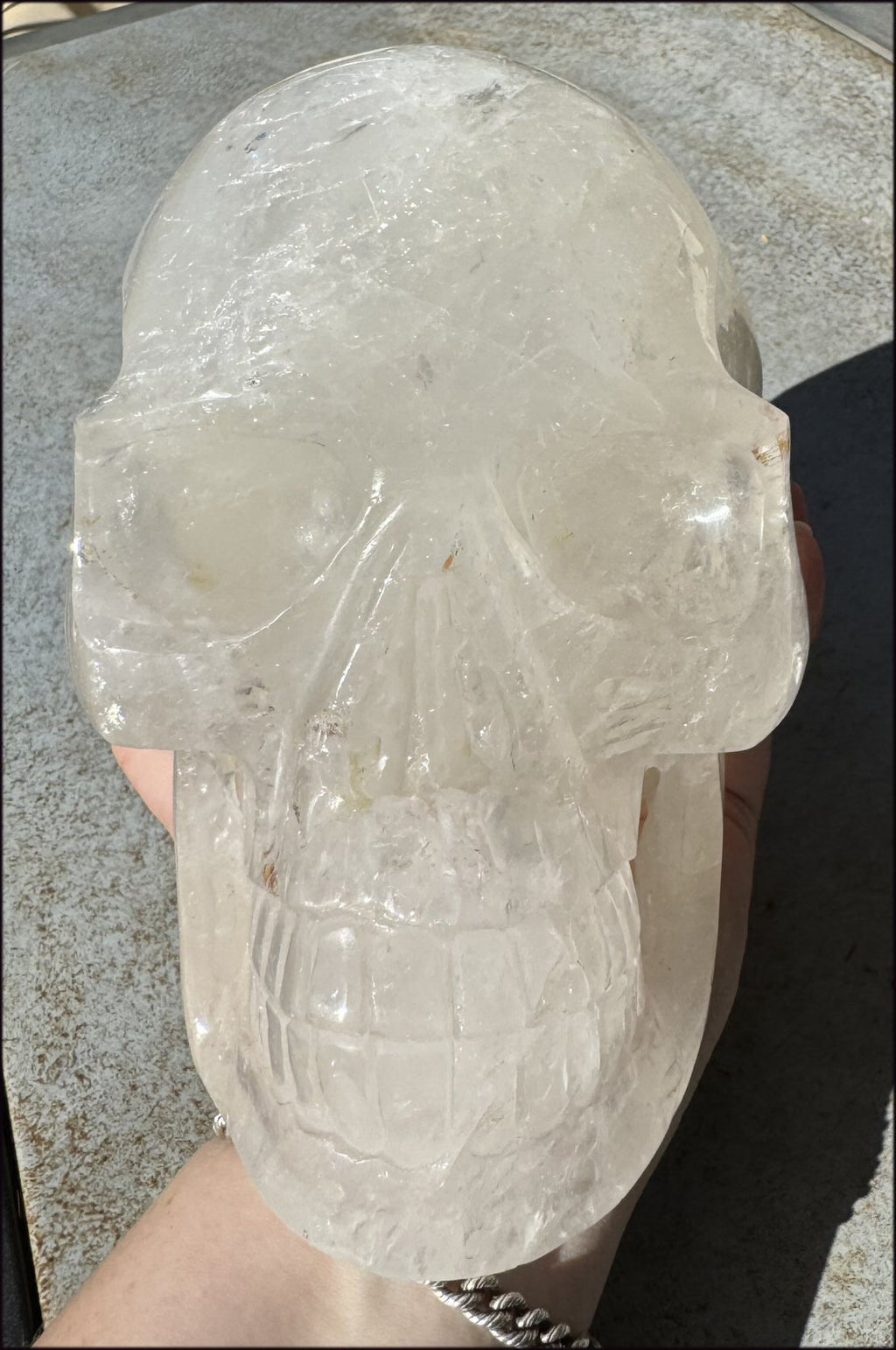 LifeSize Himalayan Quartz Crystal Skull with Crown Chakra Rainbows, Multi-Colored Hematite